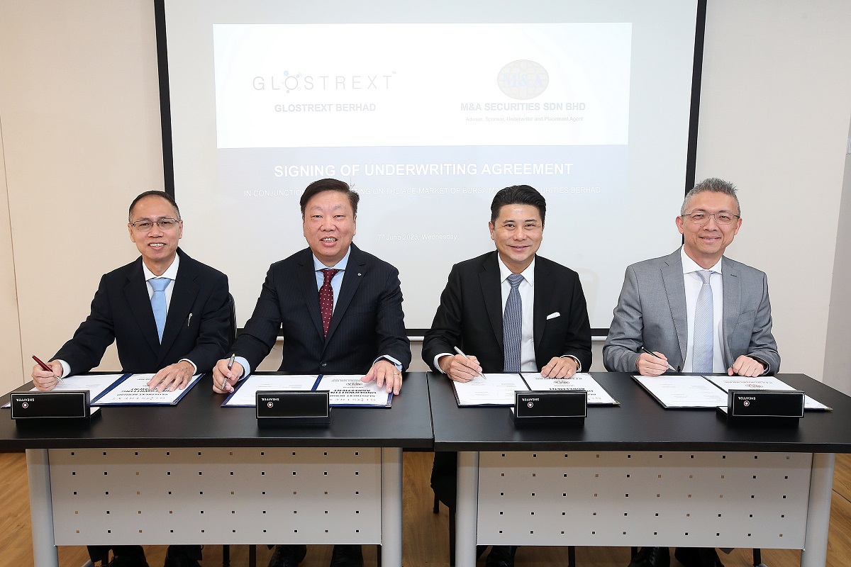 Glostrext Bhd executive director Tan Ah Huat, managing director Dr Lee Sieng Kai, M&A Securities Sdn Bhd managing director (corporate finance) Datuk Bill Tan and head of corporate finance Gary Ting at the signing ceremony on June 7.